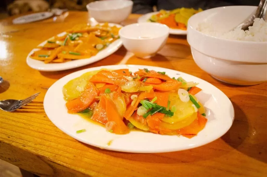 Vegan vietnamese food: sauted carrot with potato