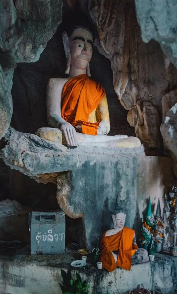 small free cave with buddha statue at Tham Chang Cave, Vang vieng