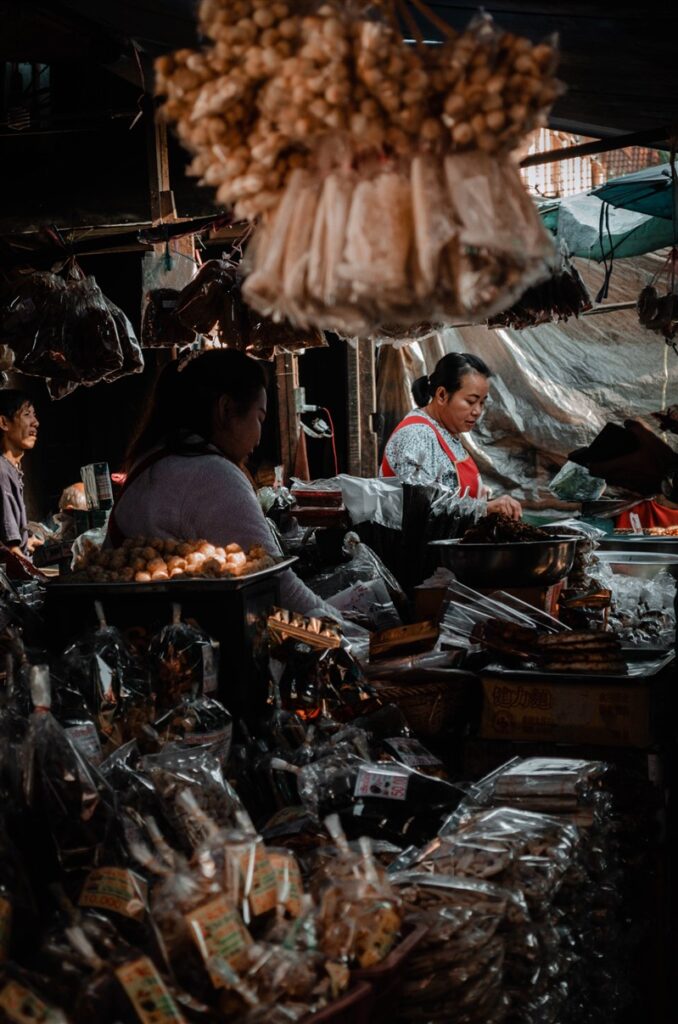 The Luang Prabang Morning Market in Laos. This is a photo of a woman selling her goods.