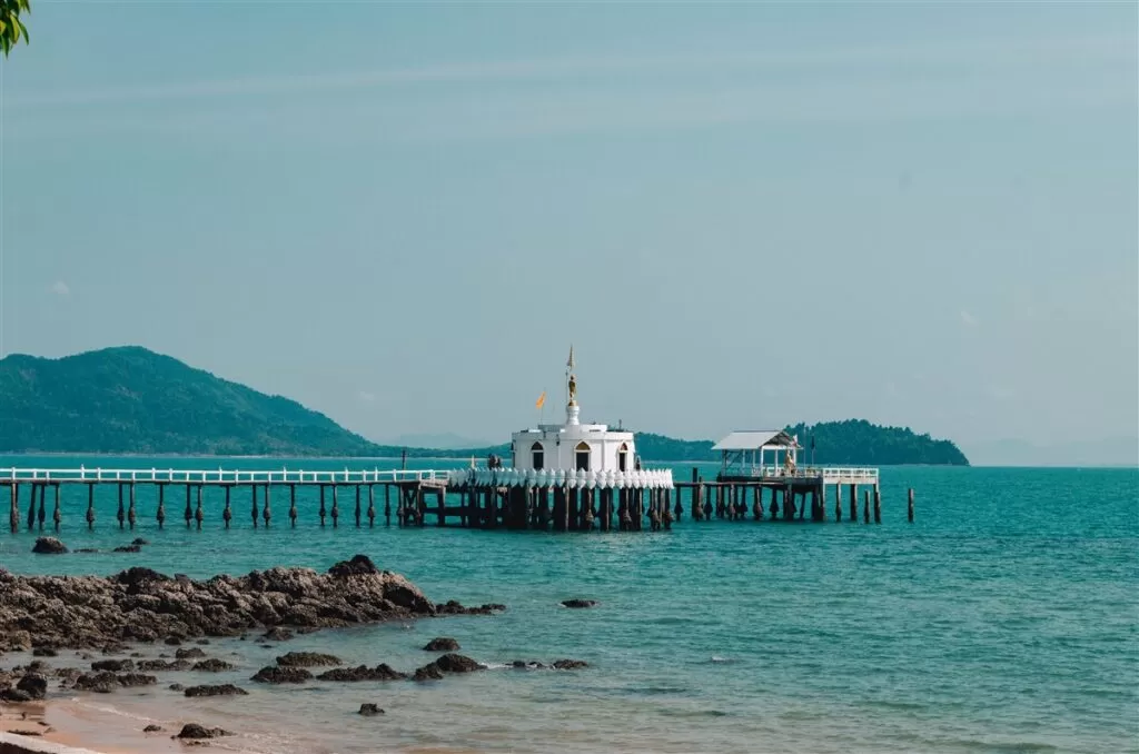 Pier with temple on Koh Phayam, Thailand