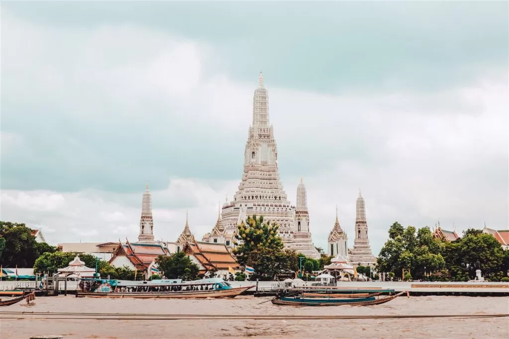The majestic towers of Wat Arun that stand tall over Bangkok and the Chao Phraya River in Thailand