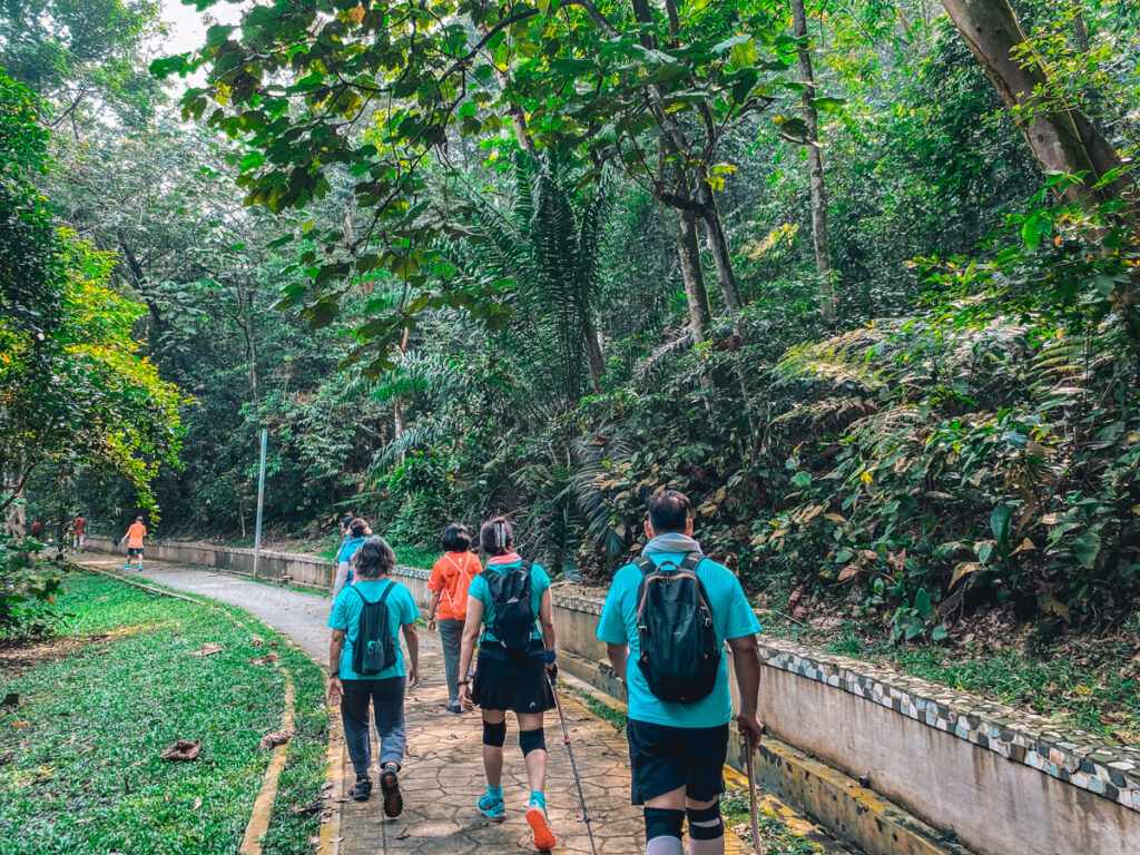 Hikers leaving for a walk in Bukit Kiara Park, KL