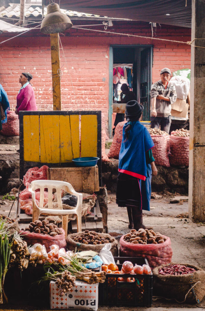 Guambino woman selling goods at the Guambino market in Silvia, Colombia