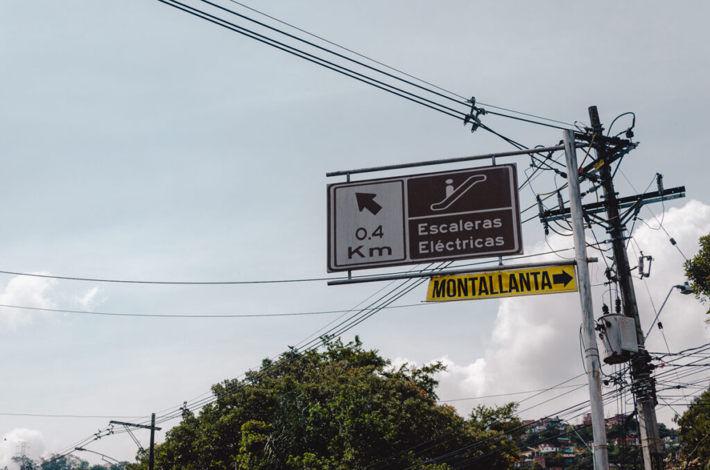 Medellin, Colombia- Comuna 13 UVA sign to the escalators