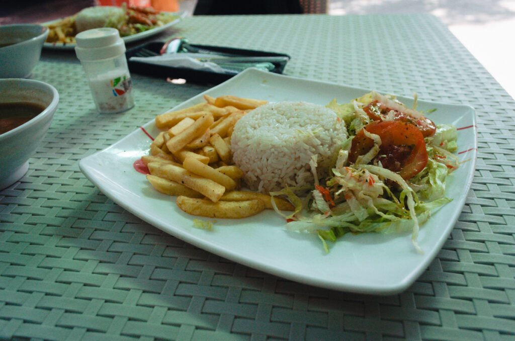 Rice, fries and salad at Gustav restaurant Dibulla, Colombia
