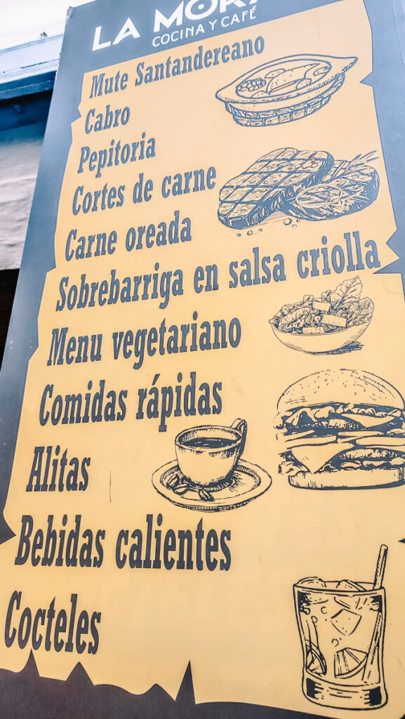 A menu showcasing appetizing food pictures, offering a visual feast for the eyes and tempting the taste buds in Barichara, Colombia.